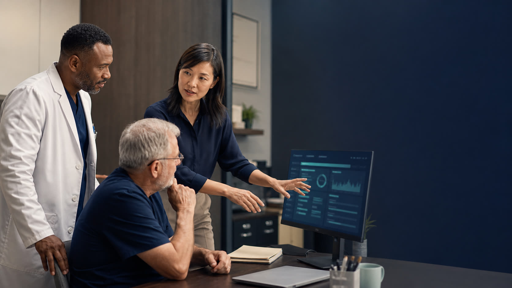 A physician, practice administrator, and experienced biller discussing a clear next action around an abstract revenue dashboard.